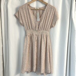 XS Sienna Sky White Dolman Sleeve V-Neck Sundress with delicate pink flowers.